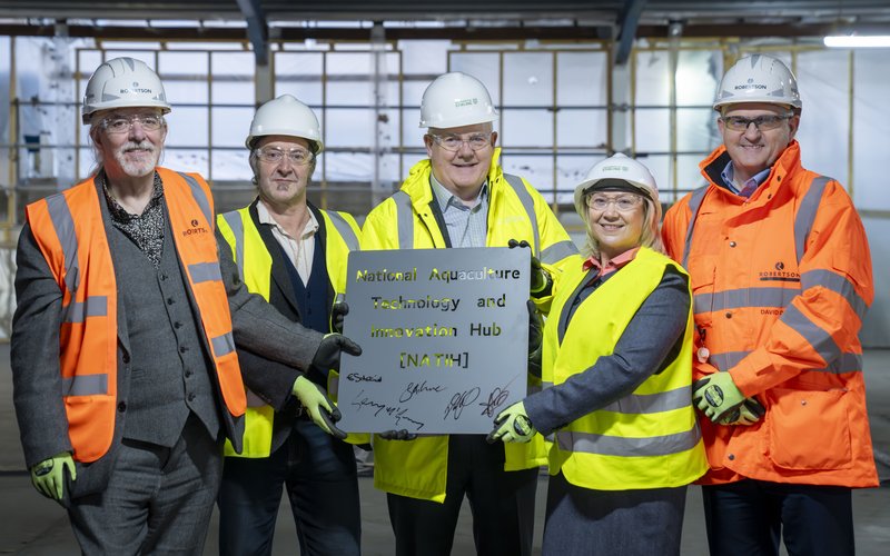 NATIH steel signing. Caption in media release. Please credit University of Stirling